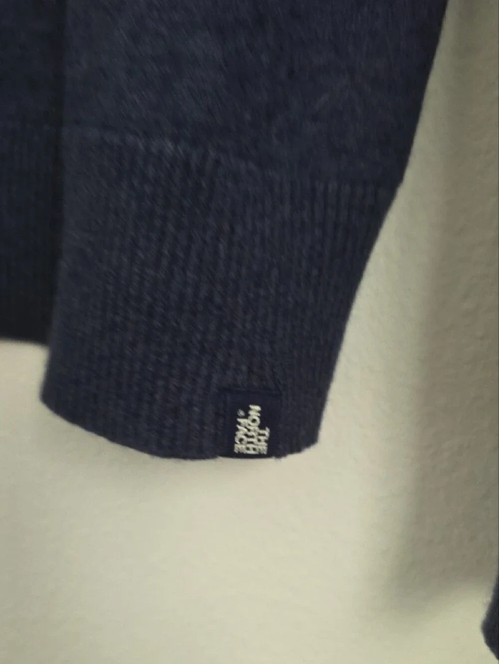The North Face Men's Dark Navy V-Neck Sweater with Teal Trim